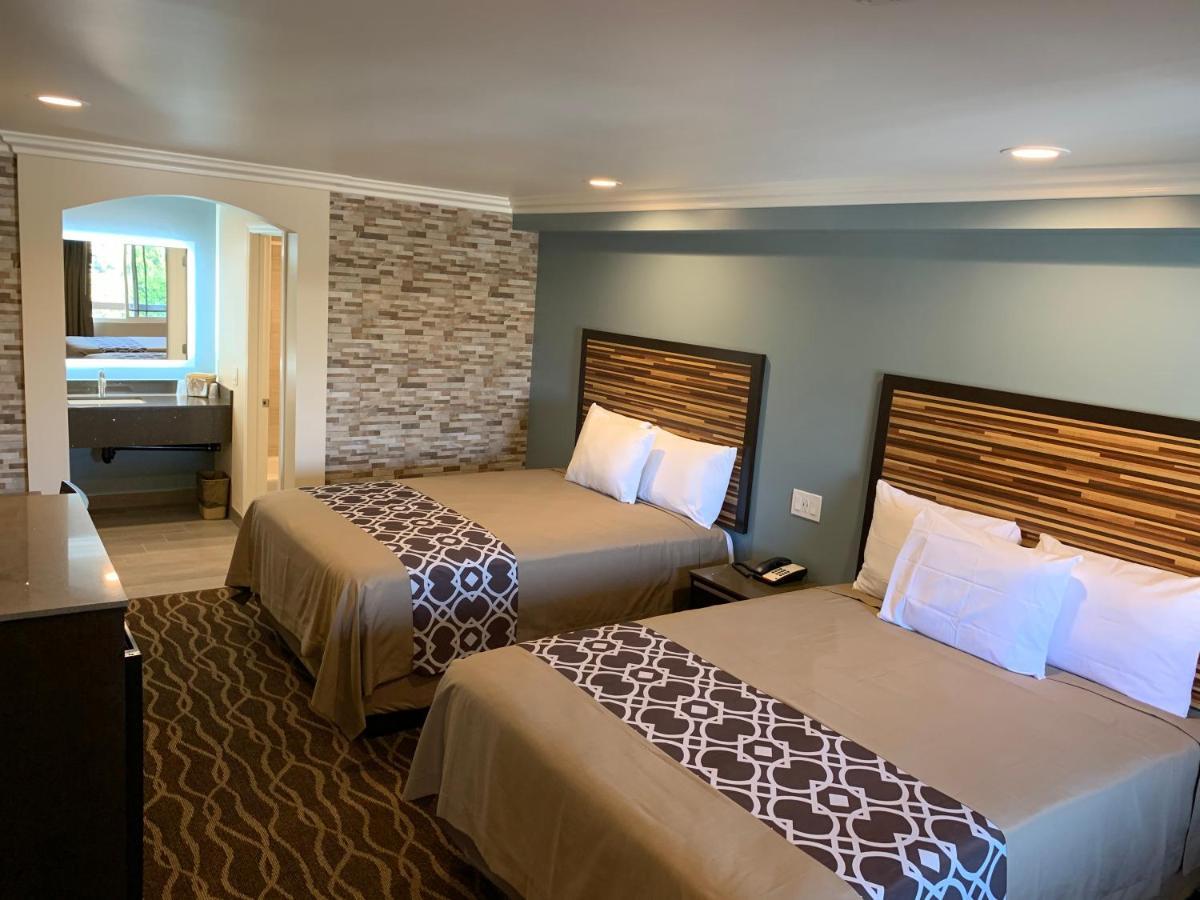 Industry Inn & Suites Ла-Пуэнте Экстерьер фото